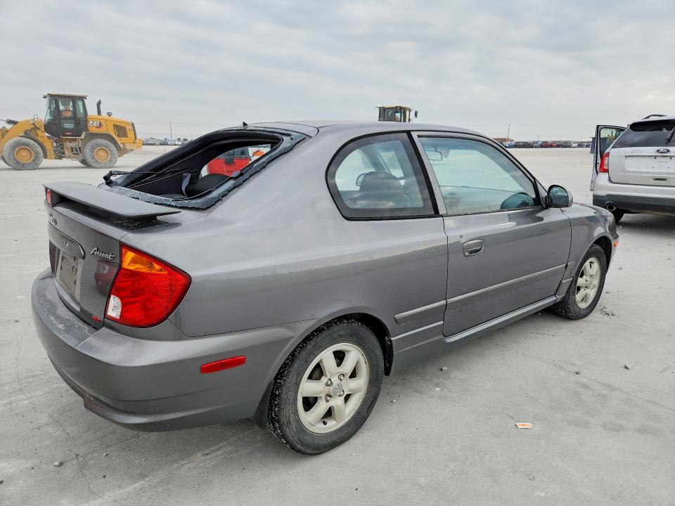 2005 Hyundai Accent VIN KMHCG35C75U322188 COPART salvage auction — HAIL, Tx - Certificate Of Title, sold $150 on 2026-07-28 (photo 3)
