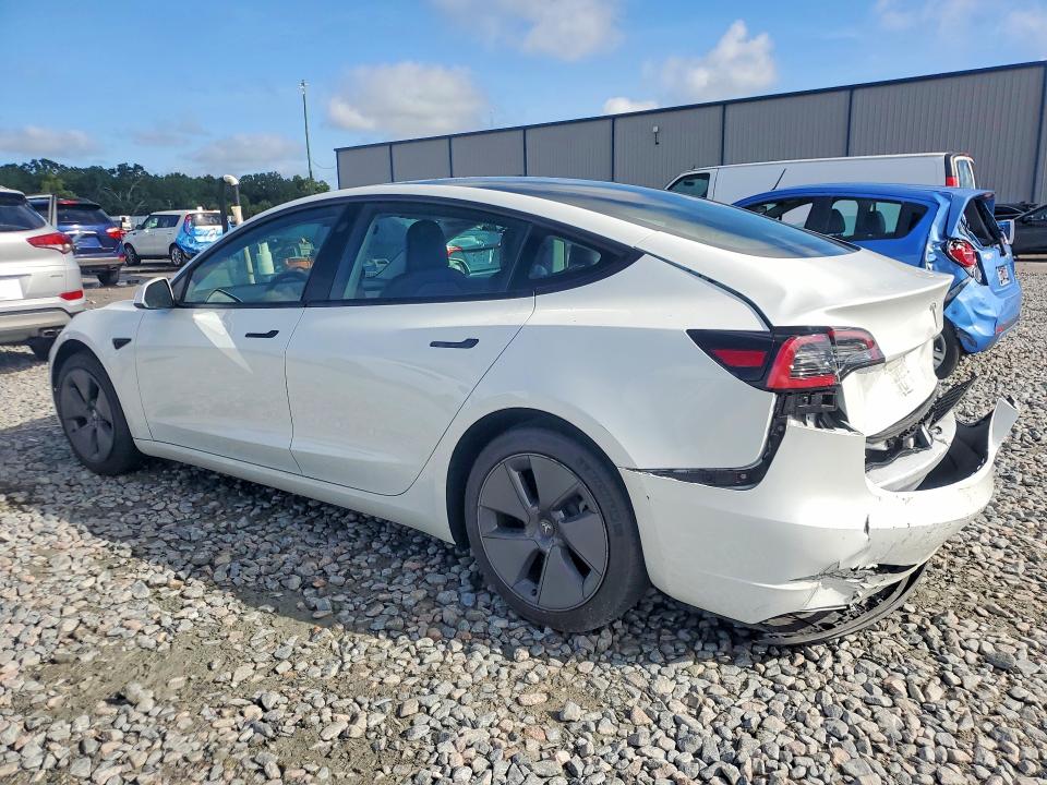 2023 Tesla Model 3 VIN 5YJ3E1EA4PF410737 COPART salvage auction — REAR END, Fl - Cert Of Title Slvg Rebuildable, sold $9,300 on 2026-07-13 (photo 2)