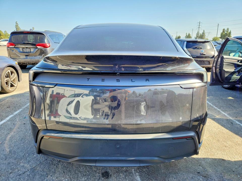 2026 Tesla VIN 7SAYGDED0TF415197 COPART salvage auction — SIDE, Ca - Salvage Certificate, sold $20,300 on 2026-07-30 (photo 6)