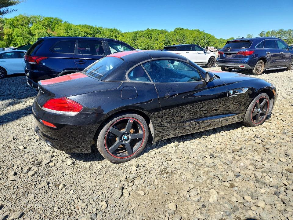 2011 BMW Z4 VIN WBALM5C59BE495940 COPART salvage auction — MINOR DENT/SCRATCHES, Fl - Cert Of Ttl-Rebuilt&Slvg Rbld (P), sold $2,700 on 2026-07-08 (photo 3)