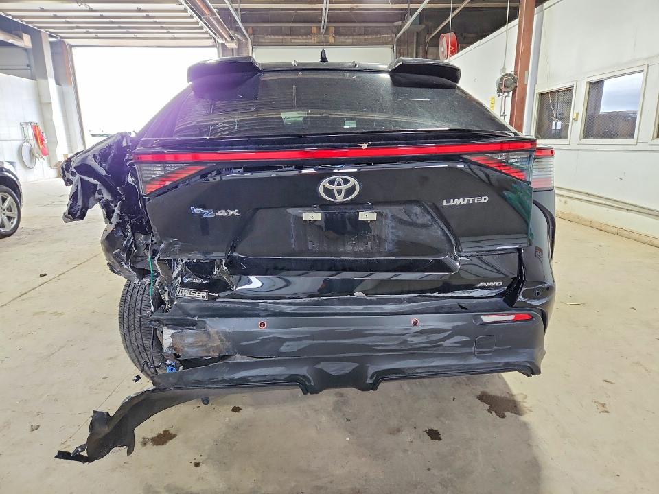 2025 Toyota Bz4x VIN JTMABACA2SA104110 COPART salvage auction — REAR END, Mn - Cert Of Title-Salvage, sold $5,200 on 2026-07-21 (photo 6)