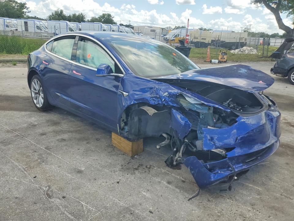 2019 Tesla Model 3 VIN 5YJ3E1EB2KF530098 COPART salvage auction — FRONT END, FL - CERT OF TITLE SLVG REBUILDABLE, sold $3,800 on 2026-07-02 (photo 4)