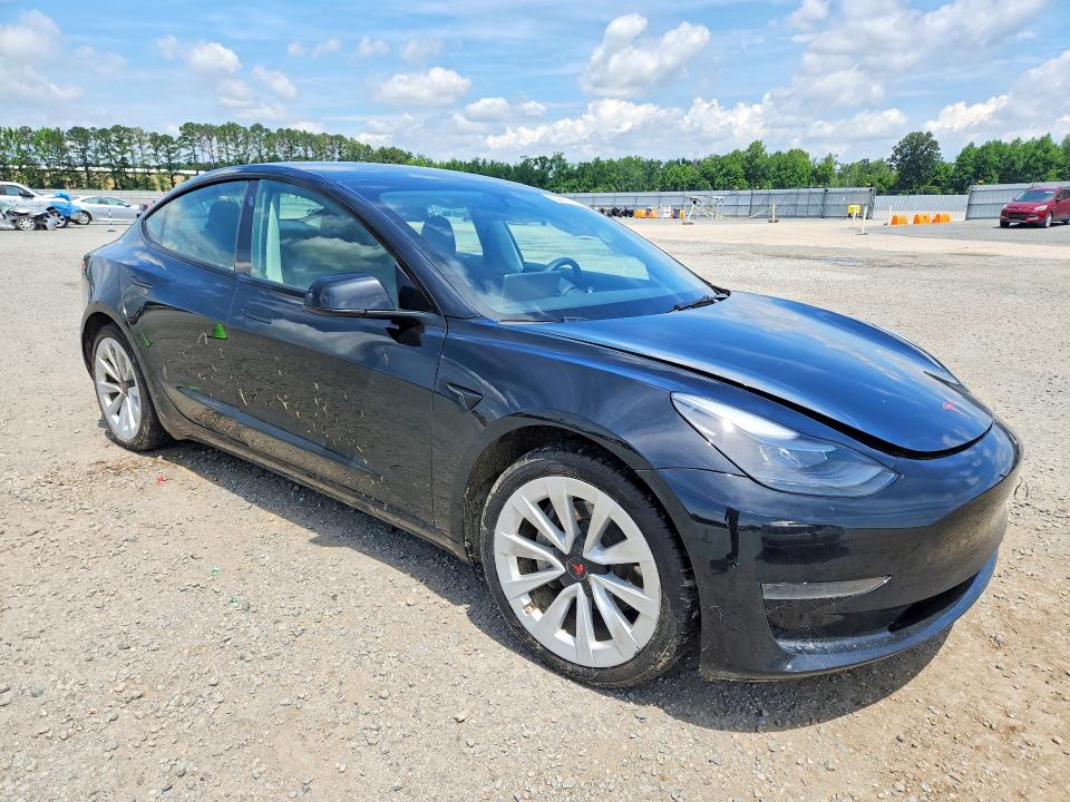 2023 Tesla Model 3 VIN 5YJ3E1EA9PF616085 COPART salvage auction — SIDE, Nc - Salvage Certificate Of Title, sold $7,000 on 2026-07-27 (photo 4)