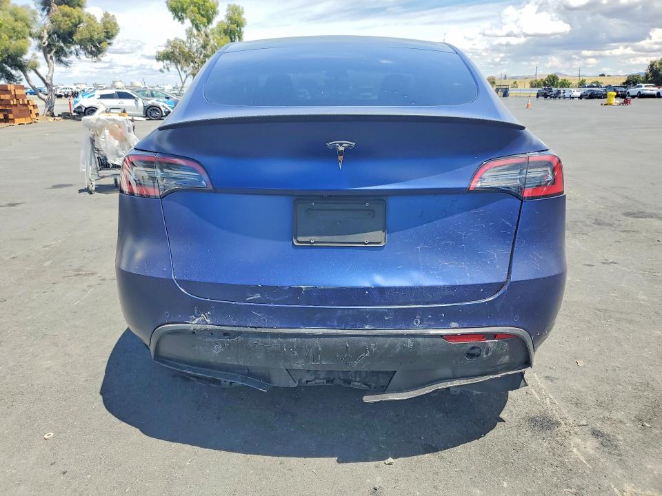 2022 Tesla Model y VIN 7SAYGDEE6NF339593 COPART salvage auction — SIDE, Ca - Salvage Certificate, sold $5,700 on 2026-07-08 (photo 6)