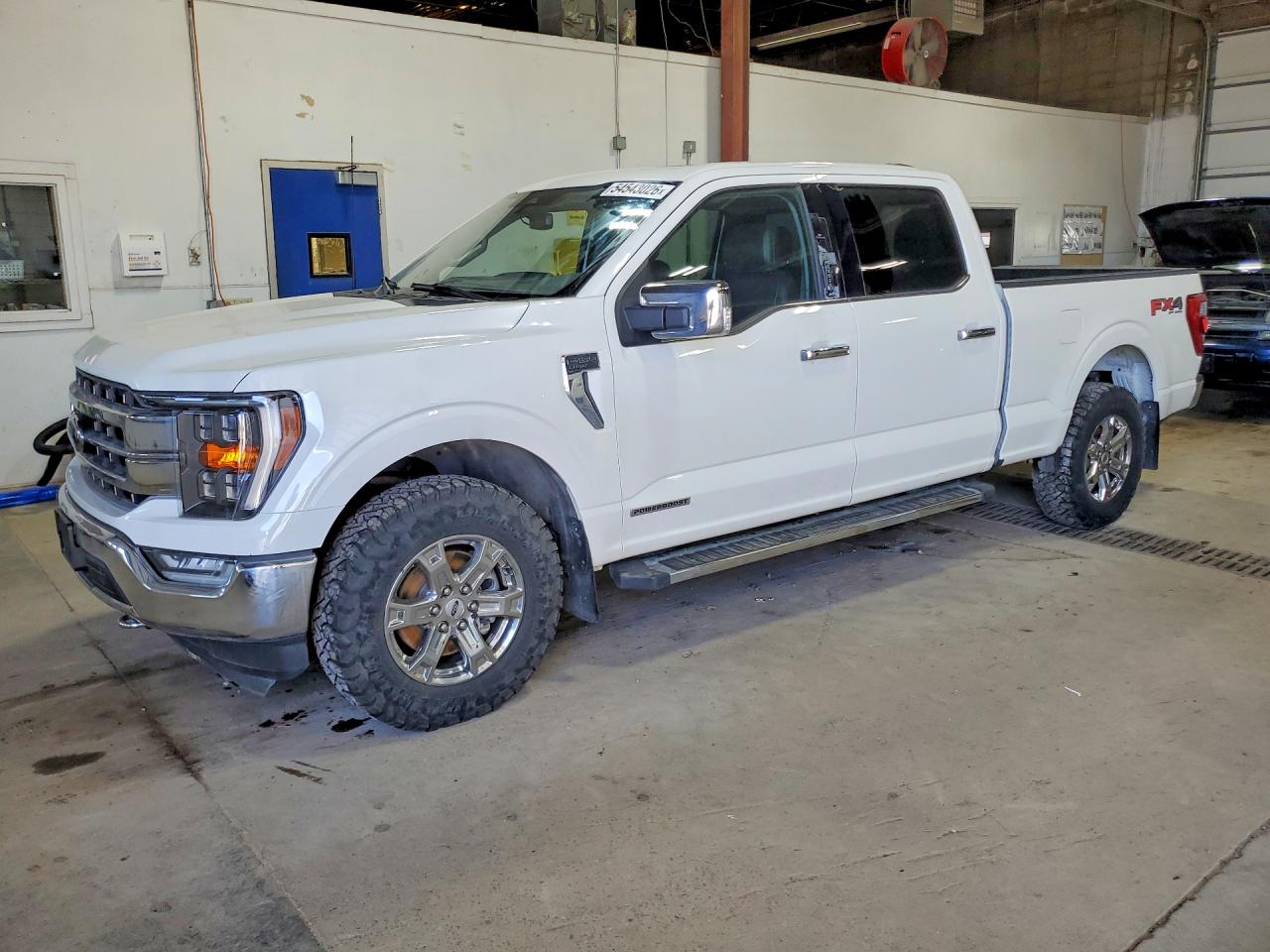 2021 Ford F-150 Lightning VIN 1FTFW1ED9MFC06852 — COPART salvage auction photo