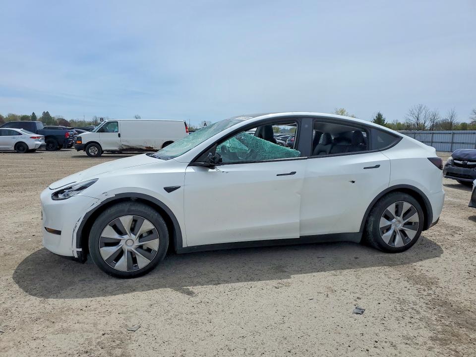 2023 Tesla Model y VIN 7SAYGAEE8PF583103 COPART salvage auction — VANDALISM, On - Permit No Brand - Unfit, sold $15,300 on 2026-07-03 (photo 1)