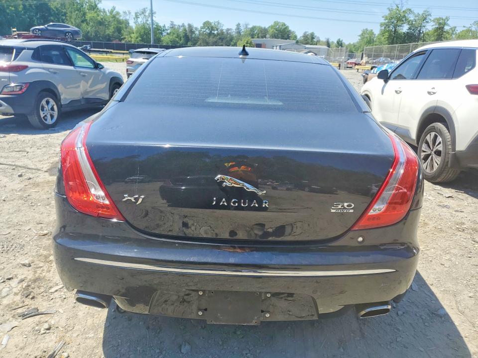 2013 Jaguar VIN SAJWJ1CDXD8V52173 COPART salvage auction — SIDE, Md - Cert Of Salvage > 75% Damage, sold $225 on 2026-07-24 (photo 6)