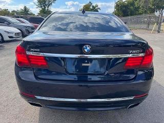 2015 BMW 7er VIN WBAYB6C5XFD965910 COPART salvage auction — DAMAGE HISTORY, Fl - Cert Of Title Slvg Rebuildable (P), sold $6,700 on 2026-07-28 (photo 6)