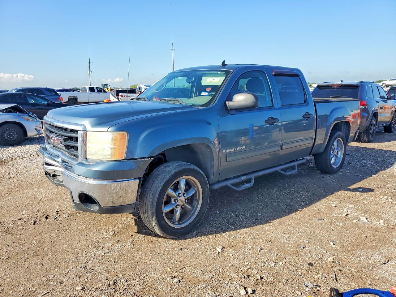 2009 GMC Sierra VIN 3GTEC13CX9G246183 COPART salvage auction — Front End, TX - SALVAGE VEHICLE TITLE, sold $1,800 on 2026-07-02 (photo 1)