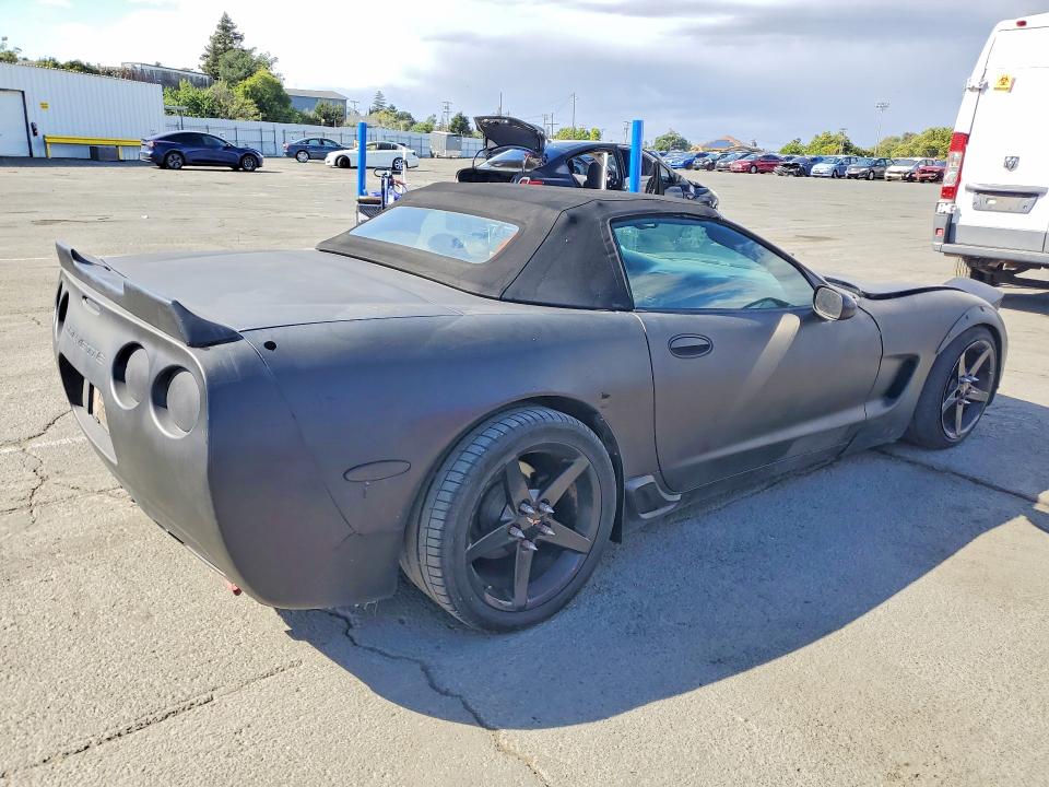 2002 Chevrolet Corvette VIN 1G1YY32G825115600 COPART salvage auction — MINOR DENT/SCRATCHES, Fl - Dis/Dlr/Exp Only Clean Title, sold $2,300 on 2026-07-31 (photo 3)