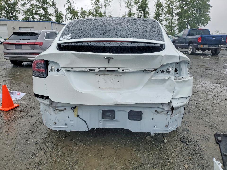 2023 Tesla VIN 7SAXCBE57PF365585 COPART salvage auction — REAR END, Salvage Title, sold $30,750 on 2026-07-13 (photo 6)