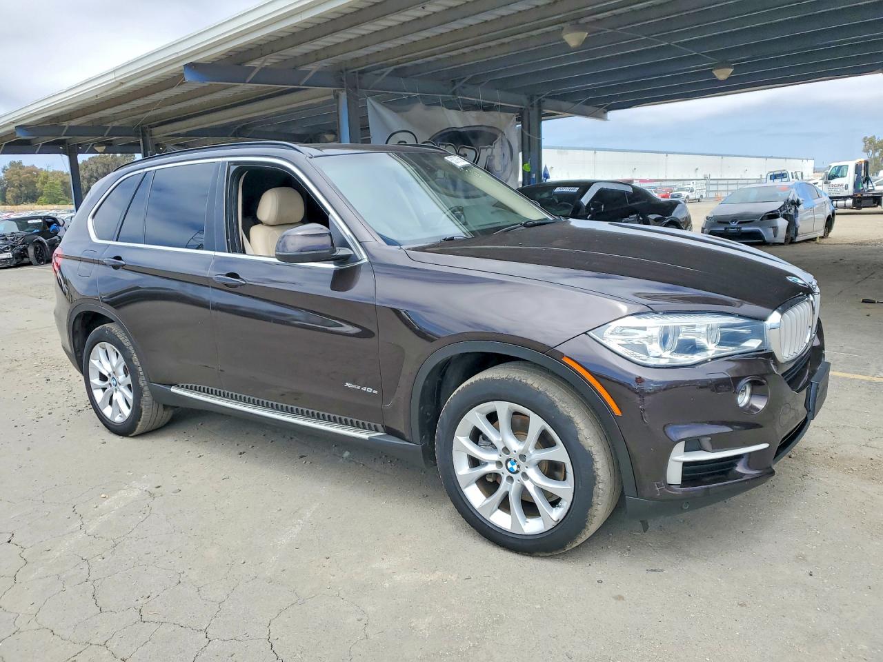 2016 BMW X5 VIN 5UXKT0C57G0F75473 COPART salvage auction — Minor Dent/Scratches, CA - DIS/DLR/EXP ONLY CLEAN TITLE, sold $3,150 on 2026-07-03 (photo 4)