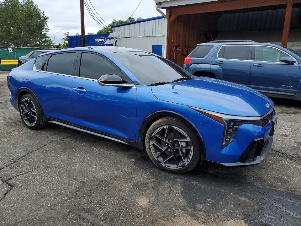 2025 Kia K4 VIN 3KPFW4DE3SE214240 COPART salvage auction — SIDE, Co - Salvage Title, sold $9,700 on 2026-08-18 (photo 4)