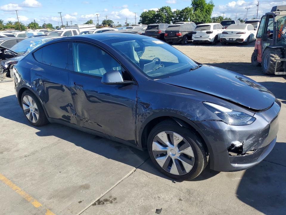 2023 Tesla Model y VIN 7SAYGDED3PF941314 COPART salvage auction — SIDE, Ca - Salvage Certificate, sold $12,600 on 2026-07-29 (photo 4)