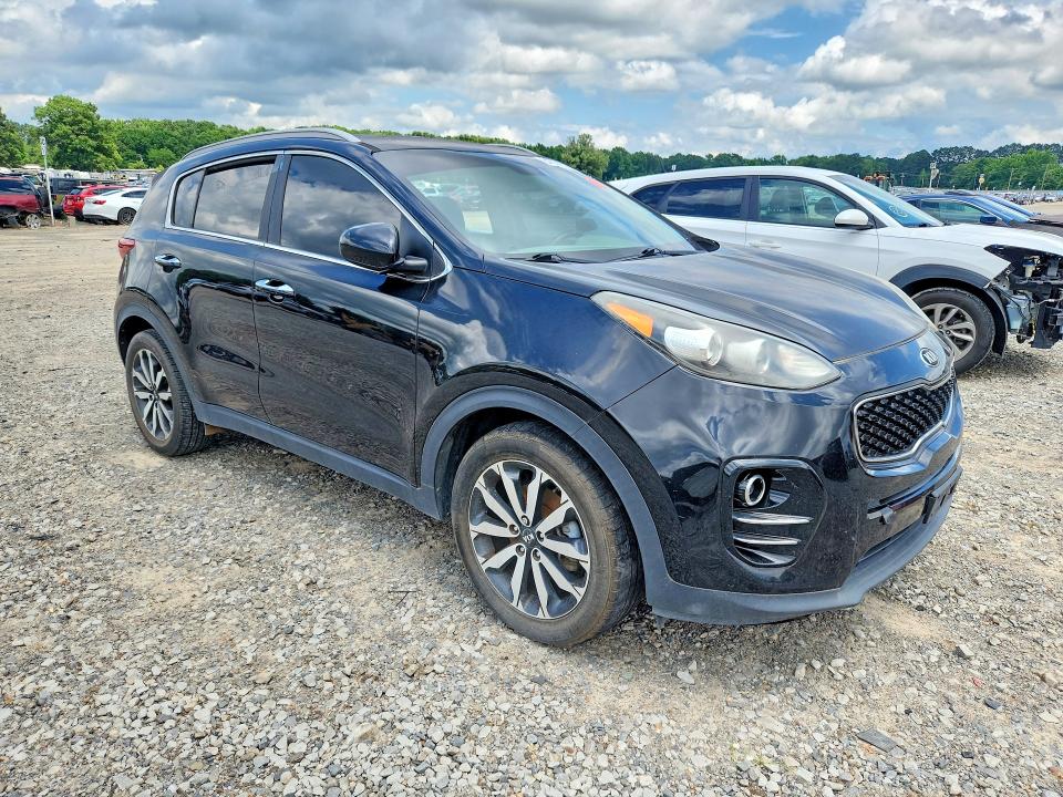 2017 Kia Sportage VIN KNDPN3AC2H7051268 COPART salvage auction — NORMAL WEAR, Mi - Certificate Of Title, sold $2,550 on 2026-07-06 (photo 4)