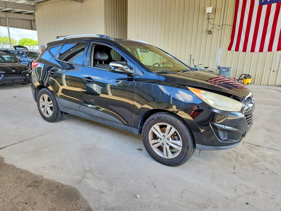 2012 Hyundai VIN KM8JU3ACXCU473657 COPART salvage auction — MINOR DENT/SCRATCHES, Fl - Cert Of Title Slvg Rebuildable, sold $1,300 on 2026-07-13 (photo 4)