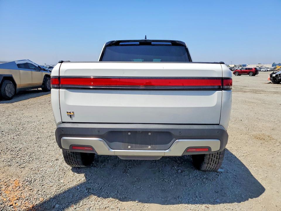 2022 Rivian VIN 7FCTGAAAXNN015566 COPART salvage auction — SIDE, Salvage Title, sold $19,500 on 2026-07-24 (photo 6)