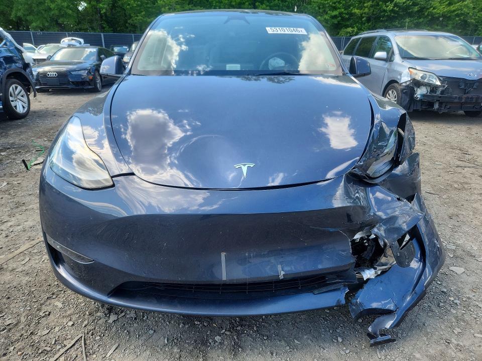 2023 Tesla Model y VIN 7SAYGDEE4PA164227 COPART salvage auction — FRONT END, MD - CERT OF SALVAGE > 75% DAMAGE, sold $10,300 on 2026-07-28 (photo 5)