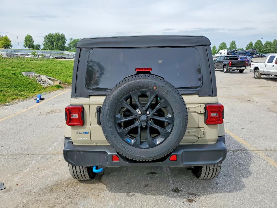 2022 Jeep Wrangler unlimited VIN 1C4JJXP61NW277006 COPART salvage auction — NORMAL WEAR, MO - CERTIFICATE OF TITLE, sold $21,000 on 2026-07-16 (photo 6)