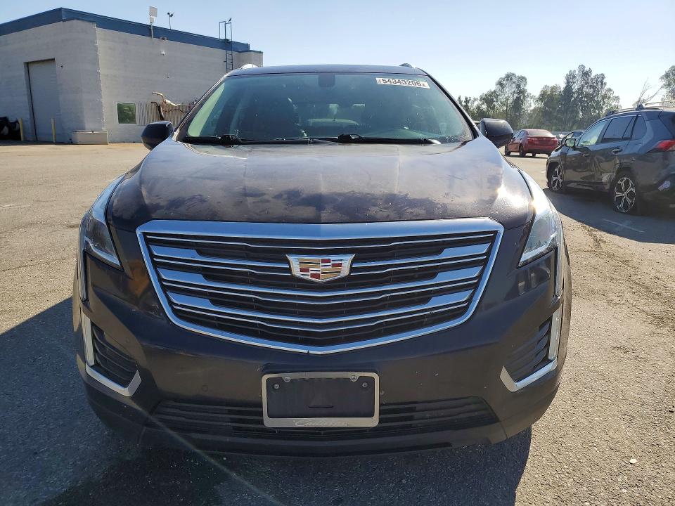 2018 Cadillac VIN 1GYKNCRS1JZ235076 COPART salvage auction — SIDE, Ca - Salvage Certificate, sold $2,700 on 2026-07-02 (photo 5)