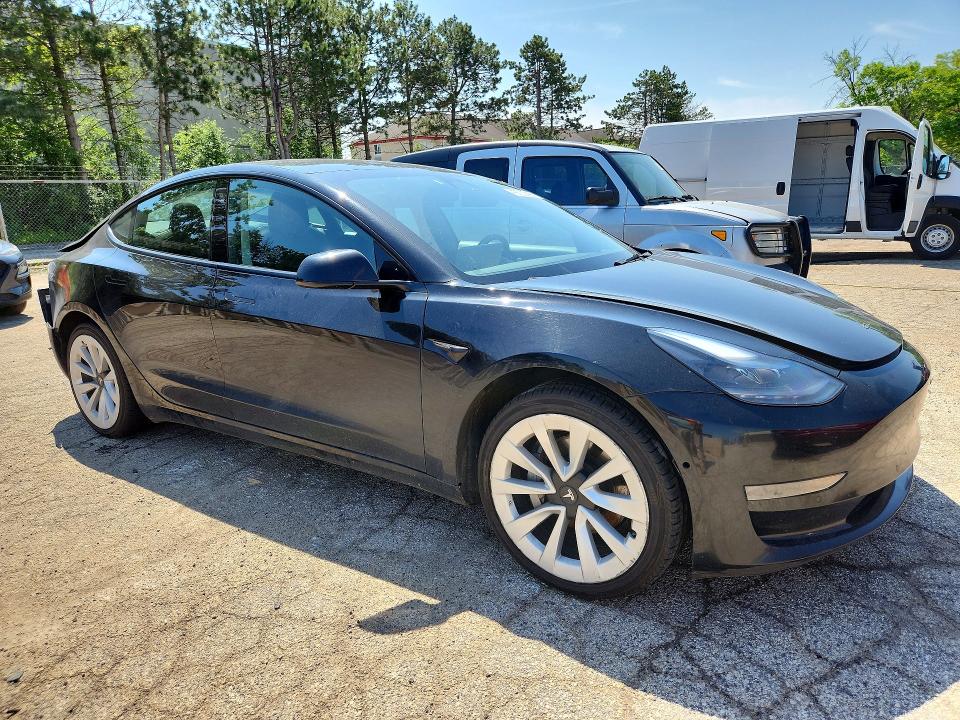 2022 Tesla Model 3 VIN 5YJ3E1EA3NF304650 COPART salvage auction — REAR END, Il - Salvage Certificate, sold $4,000 on 2026-07-06 (photo 4)