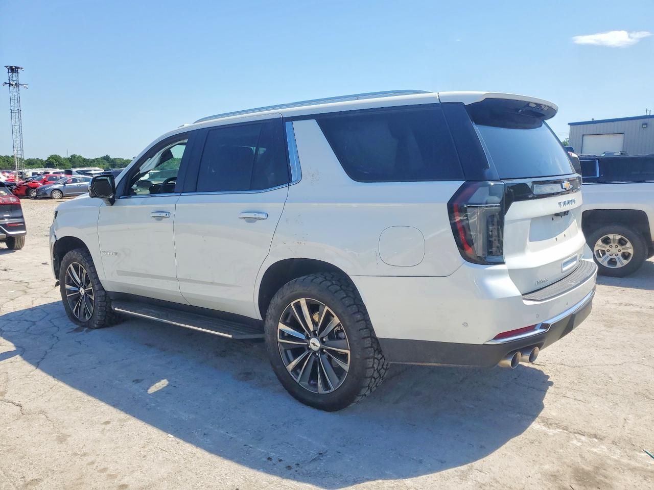 2025 Chevrolet Tahoe VIN 1GNS6SR82SR246680 COPART salvage auction — Side, OK - CERT OF TITLE-SALVAGE, sold $37,500 on 2026-06-30 (photo 2)