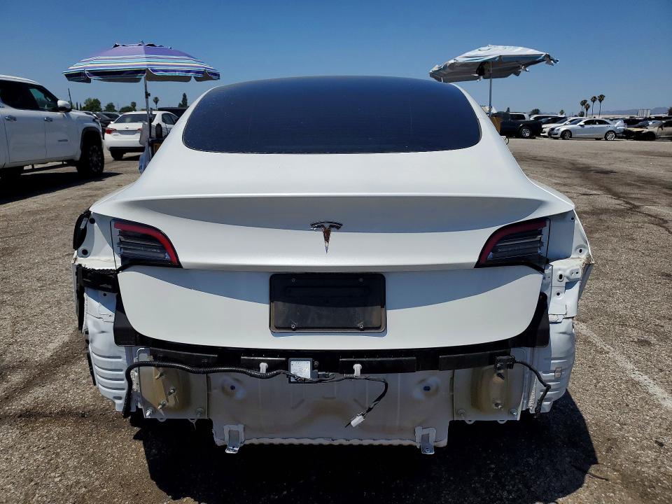 2023 Tesla Model 3 VIN 5YJ3E1EA2PF587769 COPART salvage auction — REAR END, CA - SALVAGE CERTIFICATE, sold $9,500 on 2026-07-28 (photo 6)