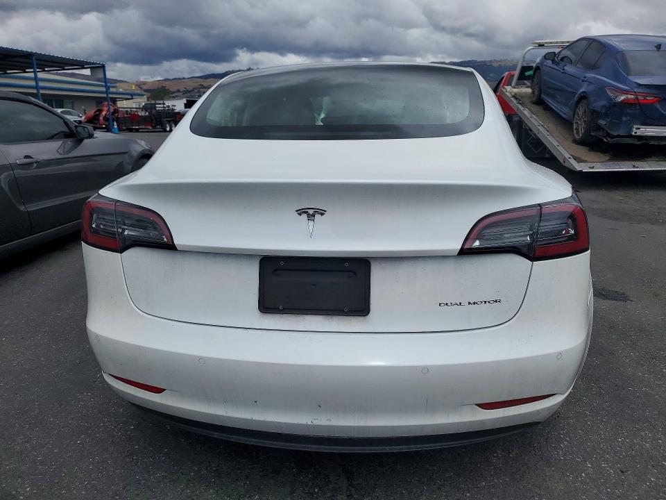 2020 Tesla Model 3 VIN 5YJ3E1EB9LF650112 COPART salvage auction — SIDE, Ca - Salvage Certificate, sold $9,600 on 2026-07-07 (photo 6)