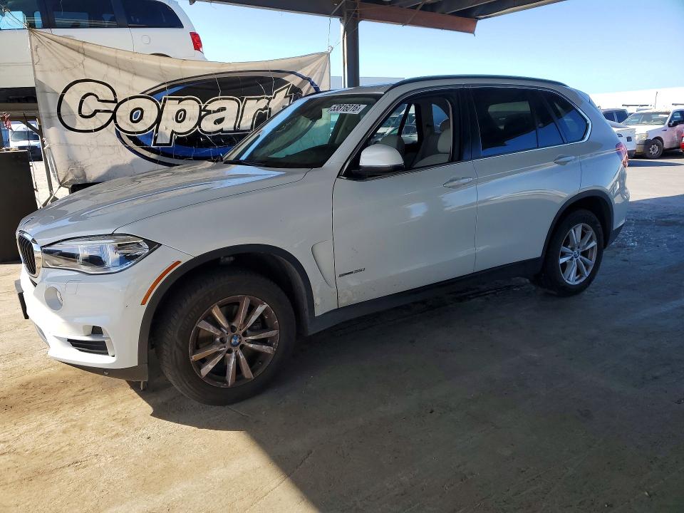 2014 BMW X5 VIN 5UXKR2C55E0C00883 — COPART salvage auction photo