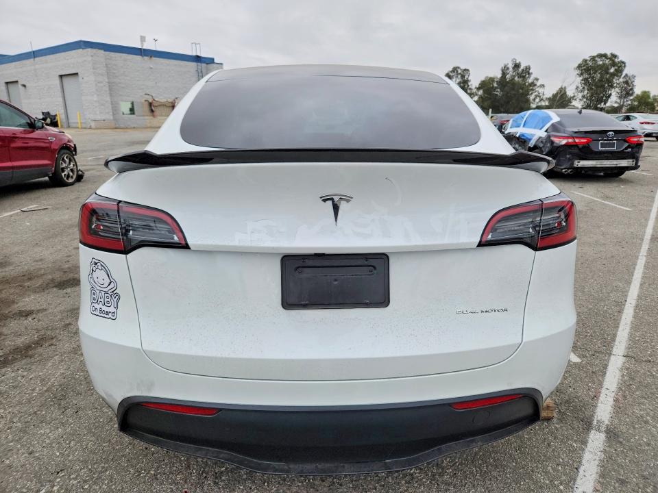 2024 Tesla Model y VIN 7SAYGDEE9RF075162 COPART salvage auction — SIDE, CA - SALVAGE CERTIFICATE, sold $150 on 2026-07-21 (photo 6)