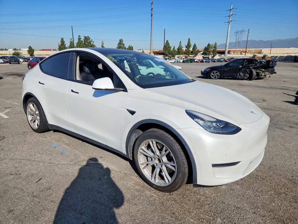 2021 Tesla Model y VIN 5YJYGDEEXMF090520 COPART salvage auction — REAR END, Ca - Salvage Certificate, sold $7,000 on 2026-07-02 (photo 4)