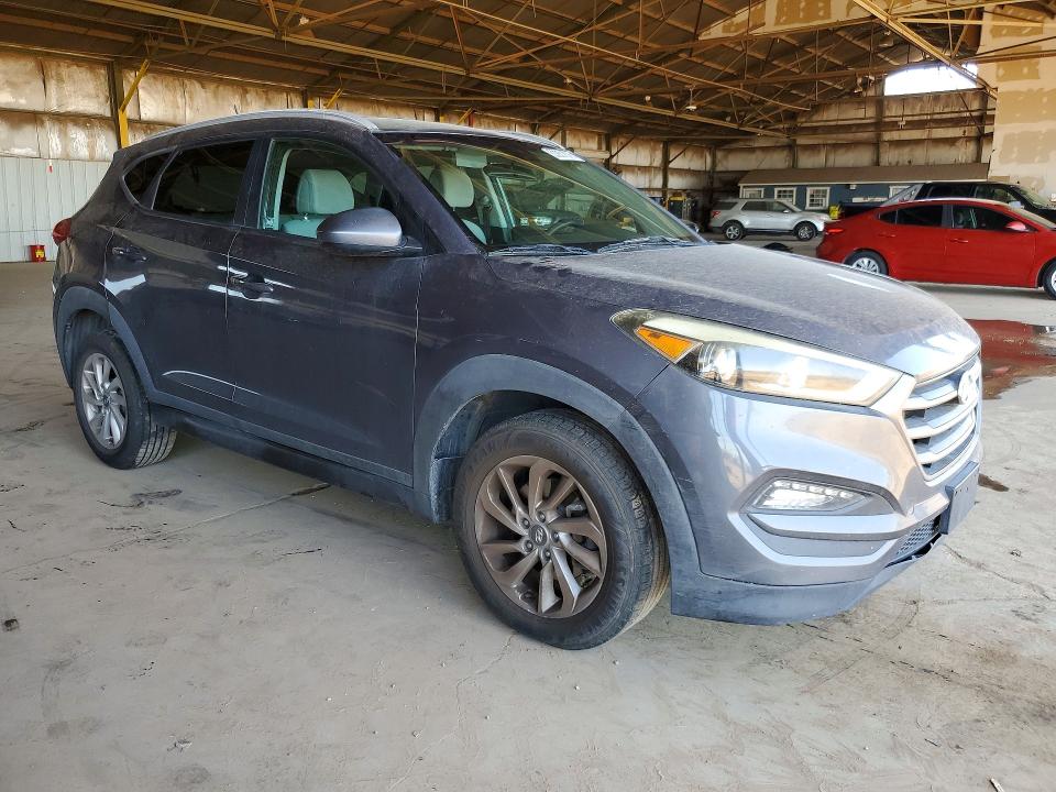 2016 Hyundai Tucson VIN KM8J33A48GU119444 COPART salvage auction — MINOR DENT/SCRATCHES, Az - Certificate Of Title, sold $2,525 on 2026-07-02 (photo 4)