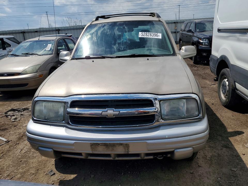 2002 Chevrolet Tracker VIN 2CNBJ634426925409 COPART salvage auction — NORMAL WEAR, Il - Certificate Of Title, sold $500 on 2026-07-02 (photo 5)