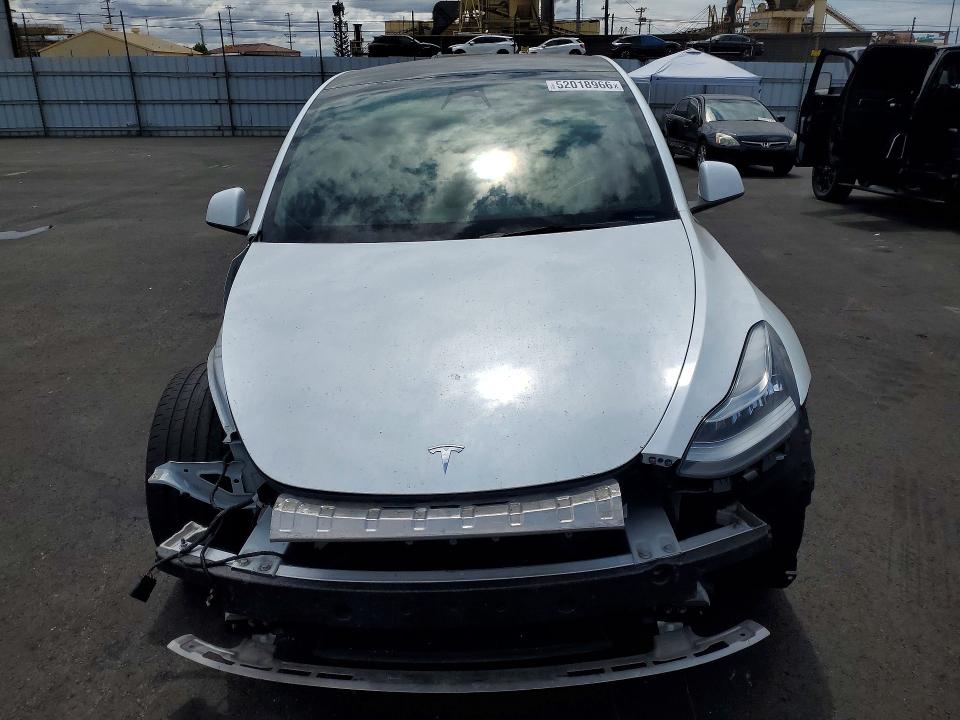 2023 Tesla Model y VIN 7SAYGDEE0PA071687 COPART salvage auction — FRONT END, Salvage Title, sold $12,200 on 2026-07-22 (photo 5)