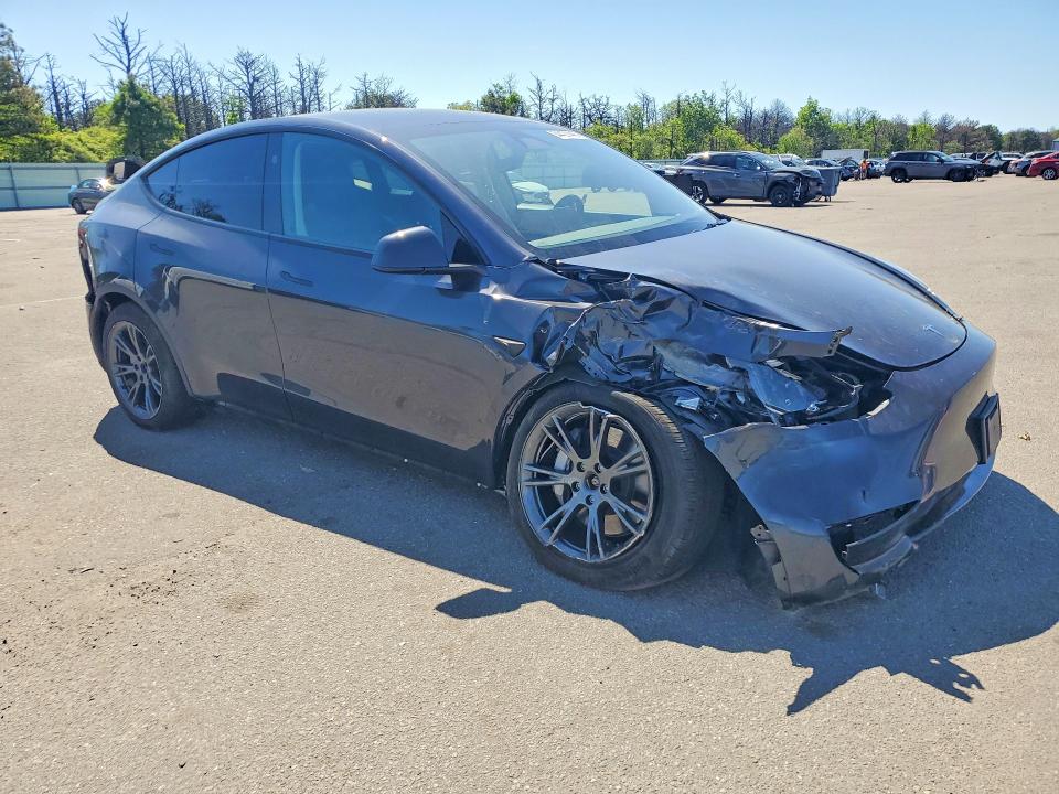 2025 Tesla Model y VIN 7SAYGDEE4SF224017 COPART salvage auction — FRONT END, Ny - Mv-907A Salvage Certificate, sold $11,200 on 2026-07-13 (photo 4)