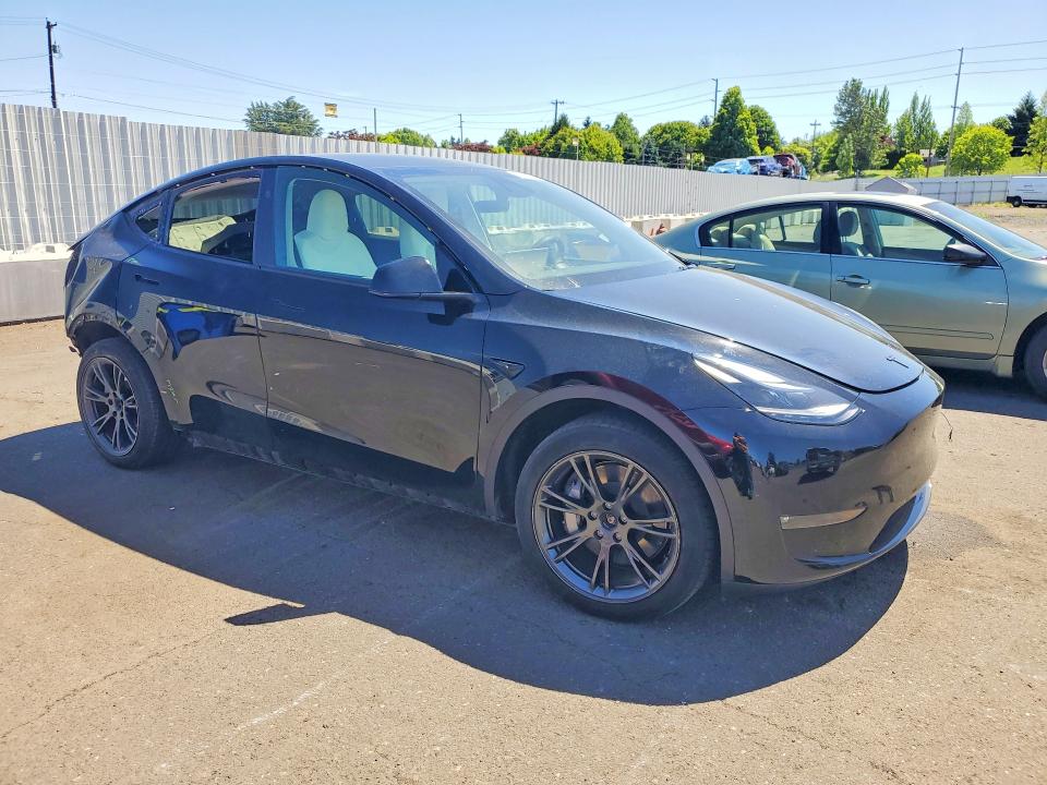 2024 Tesla Model y VIN 7SAYGDEEXRF129701 COPART salvage auction — REAR END, Id - Salvage Certificate Of Title, sold $13,600 on 2026-07-29 (photo 4)