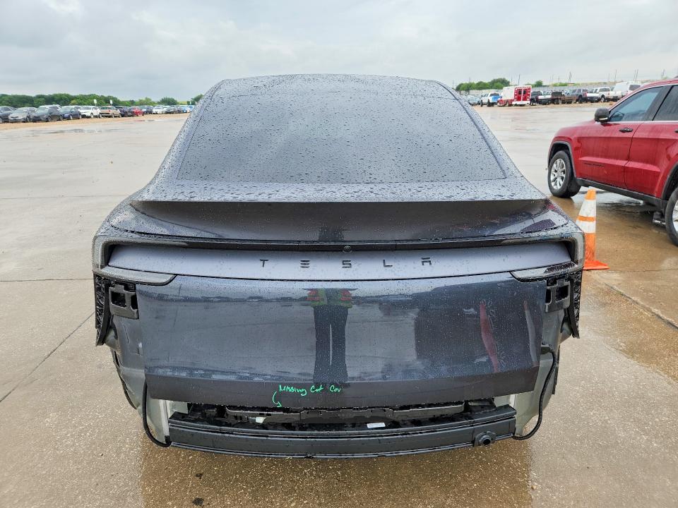 2026 Tesla Model y VIN 7SAYGDED8TA684593 COPART salvage auction — REAR END, TX - SALVAGE VEHICLE TITLE, sold $18,200 on 2026-07-30 (photo 6)