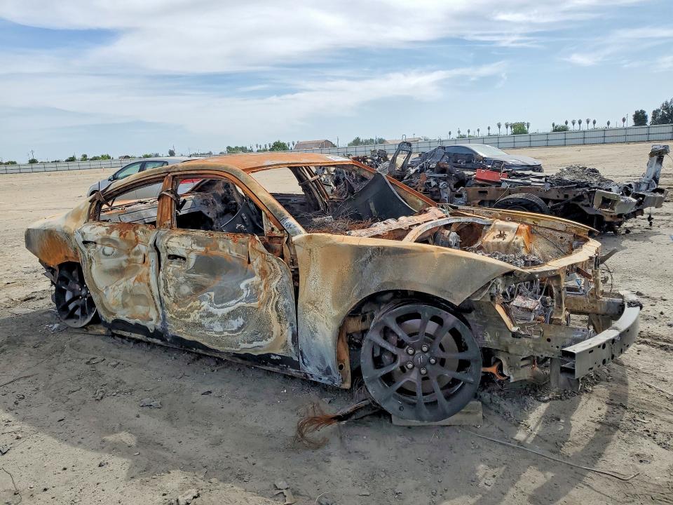 2022 Dodge Charger VIN 2C3CDXGJ2NH147386 COPART salvage auction — BURN, Ca - Non-Repairable Vehicle Cert, sold $60 on 2026-07-02 (photo 4)