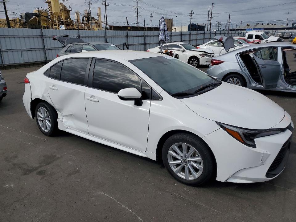 2023 Toyota Corolla VIN JTDBCMFE9P3006186 COPART salvage auction — SIDE, Ca - Salvage Certificate, sold $6,200 on 2026-07-20 (photo 4)