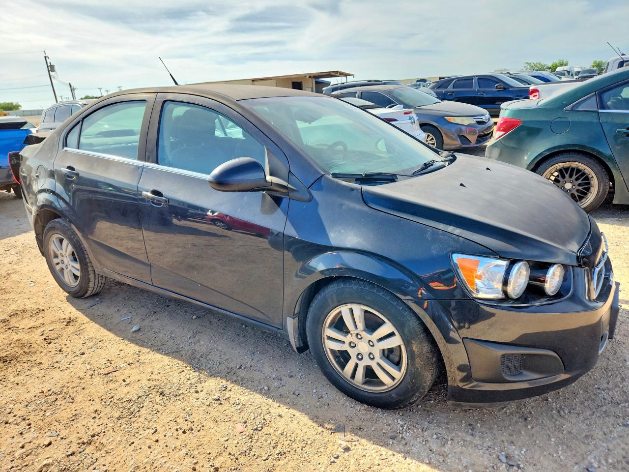 2014 Chevrolet Sonic VIN 1G1JC5SG0E4129125 COPART salvage auction — Front End, TX - SALVAGE VEHICLE TITLE, sold $325 on 2026-06-25 (photo 4)