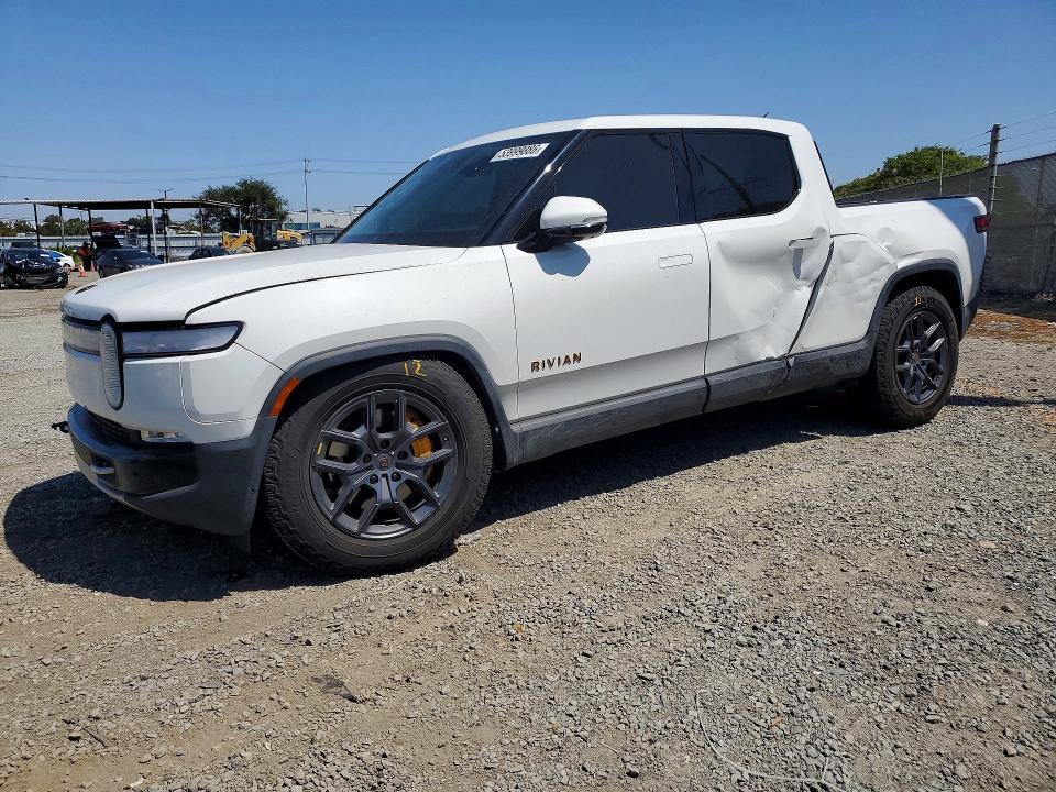 2022 Rivian VIN 7FCTGAAAXNN015566 COPART salvage auction — SIDE, Salvage Title, sold $19,500 on 2026-07-24 (photo 1)
