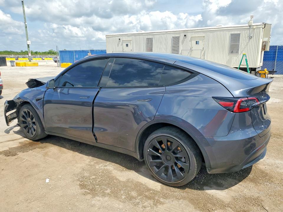 2023 Tesla Model y VIN 7SAYGDEE5PF629696 COPART salvage auction — FRONT END, FL - CERTIFICATE OF TITLE, sold $7,200 on 2026-07-16 (photo 2)