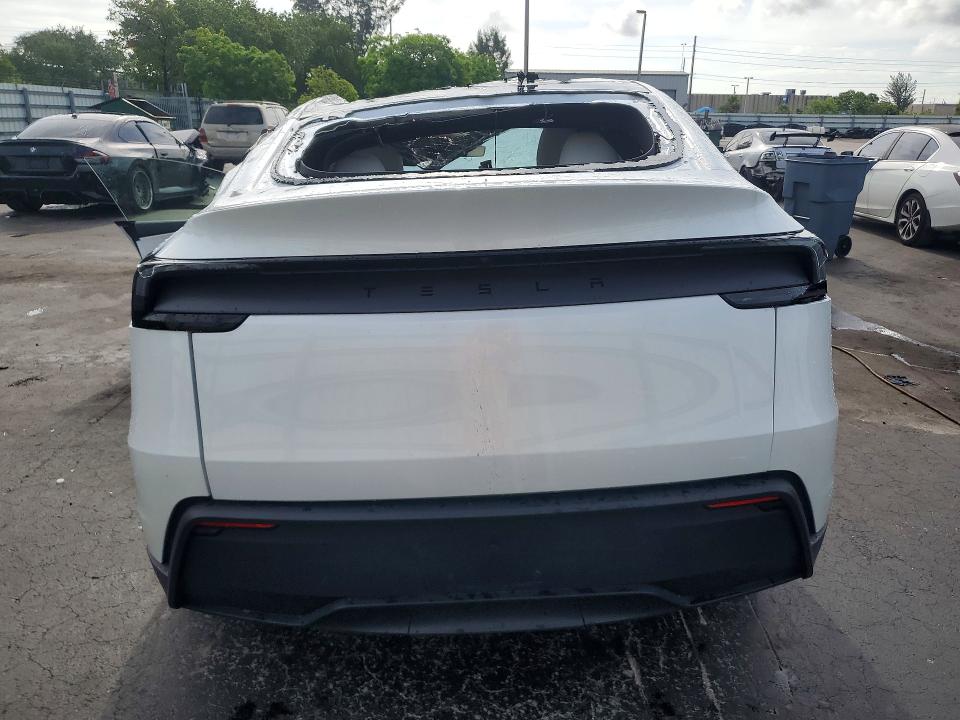 2026 Tesla Model y VIN 7SAYGDED6TA644142 COPART salvage auction — ALL OVER, Fl - Certificate Of Destruction, sold $300 on 2026-07-27 (photo 6)