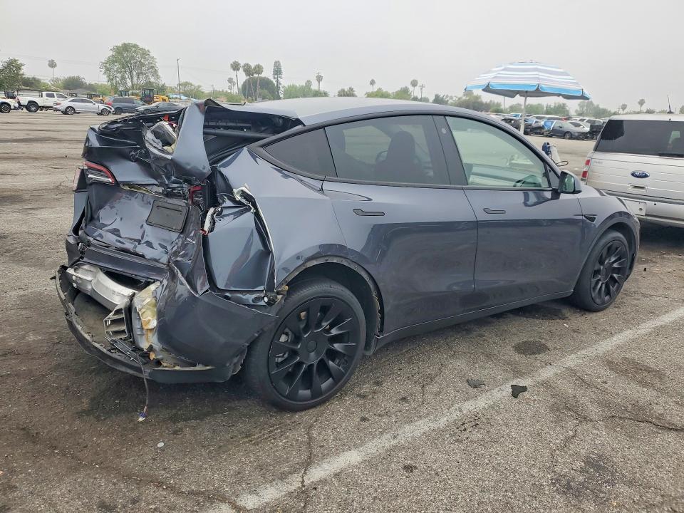2023 Tesla Model y VIN 7SAYGDEE9PA113967 COPART salvage auction — REAR END, Ca - Salvage Certificate, sold $7,500 on 2026-07-17 (photo 3)