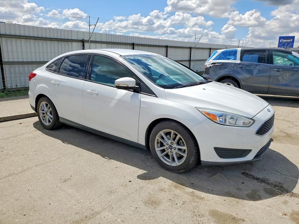 2017 Ford Focus VIN 1FADP3F28HL223183 COPART salvage auction — SIDE, Salvage Title, sold $800 on 2026-07-10 (photo 4)