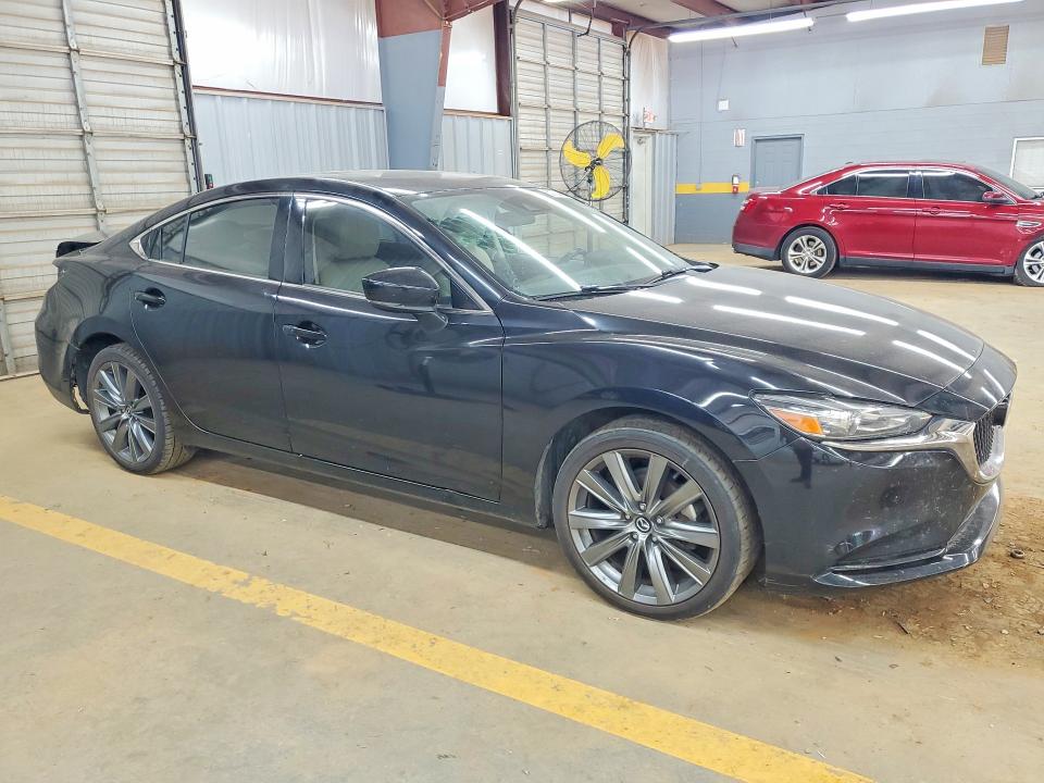 2021 Mazda VIN JM1GL1VM3M1606528 COPART salvage auction — REAR END, NC - SALVAGE CERTIFICATE OF TITLE, sold $3,700 on 2026-07-08 (photo 4)