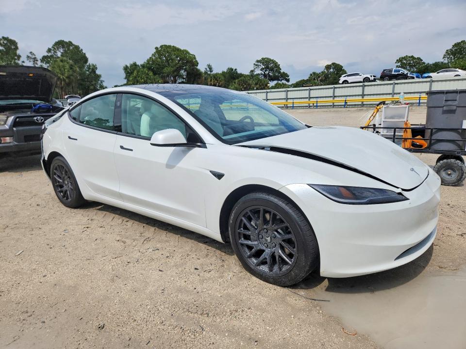 2024 Tesla VIN 5YJ3E1EB2RF810999 COPART salvage auction — REAR END, Fl - Cert Of Title Slvg Rebuildable, sold $11,500 on 2026-07-15 (photo 4)