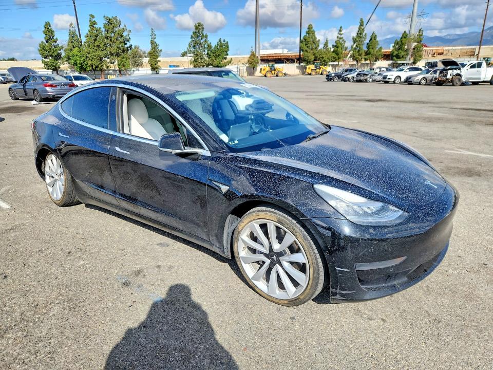 2020 Tesla Model 3 VIN 5YJ3E1EA2LF744095 COPART salvage auction — SIDE, Ca - Salvage Certificate, sold $5,600 on 2026-07-14 (photo 4)