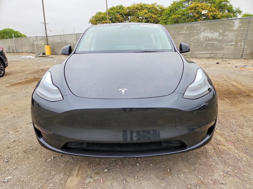 2025 Tesla Model y VIN 7SAYGDED0SF253523 COPART salvage auction — SIDE, Ca - Salvage Certificate, sold $13,600 on 2026-07-24 (photo 5)