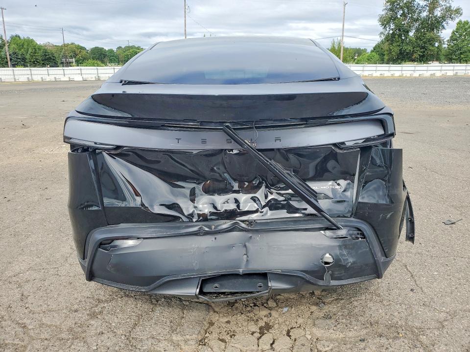 2026 Tesla Model y VIN 7SAYGDEE6TF567123 COPART salvage auction — REAR END, Or - Salvage Title Certificate, sold $18,100 on 2026-07-13 (photo 6)